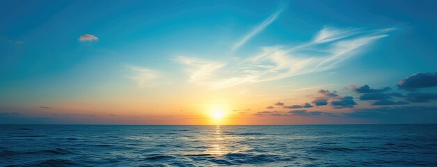 Obraz premium Serene Ocean Panorama at Sunset with Vivid Sky