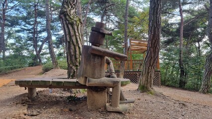 Pine Tree and Wooden Figure, Wood doll Side
