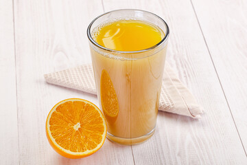 Sweet fresh orange juice in the glass