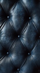 Fototapeta premium Blue leather upholstery with button details, close
