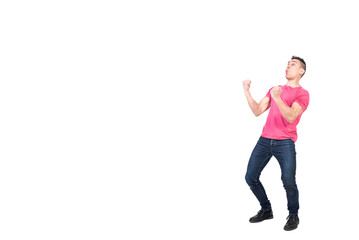 Male winner clenching fists and celebrating success