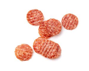 Salami chips isolated, wavy sausage slices, sliced dry chorizo, sausages thin pieces, pepperoni pizza ingredient