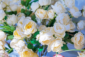 beautiful bouquet of delicate cream flowers in the interior