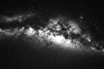 Fototapeta premium Milky way galaxy spanning across the night sky filled with stars