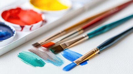 Obraz premium watercolor painting palette and paint brush