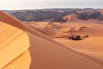 The Tadrart Rouge means Red Mountain. It is a mountain range in southeastern Algeria. The area has a rich array of rock art.