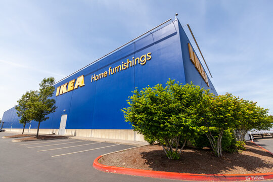 Portland, Oregon, USA-May 12, 2019: Ikea famous Swedish furniture store warehouse with its big yellow logo sign, near PDX airport in Portland. High quality picture for download