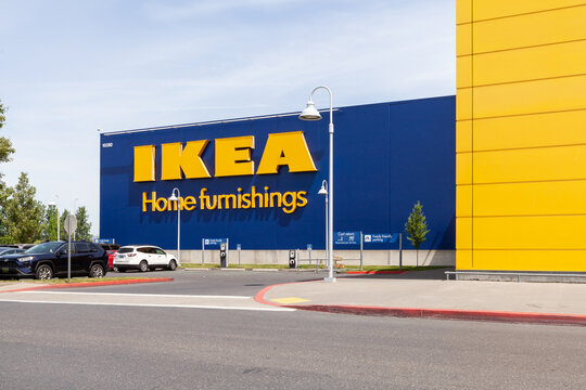 Portland, Oregon, USA-May 12, 2019: Ikea famous Swedish furniture store warehouse with its big yellow logo sign, near PDX airport in Portland. High quality picture for download