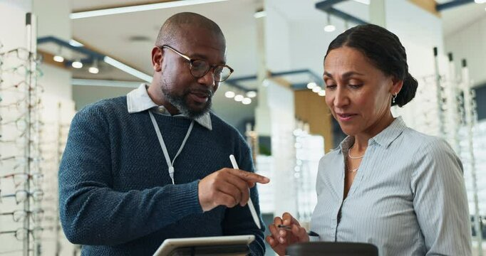 People, optometrist and tablet with eyewear at store for eye exam results, medical prescription or retail inventory. Smile, staff and digital for assessment schedule, online service and stock review
