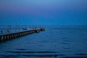 lonely pier in the evening on the Baltic Sea