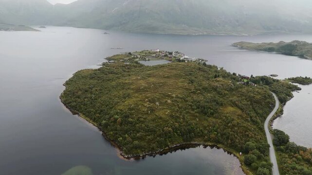 Drone flight over the Sildpollnes penisula in the Norwegian fjord in a foggy day