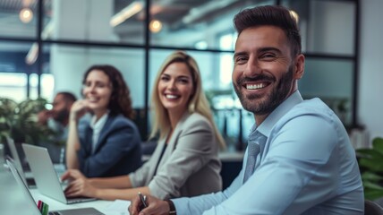 Obraz premium Positive business professionals working together in office