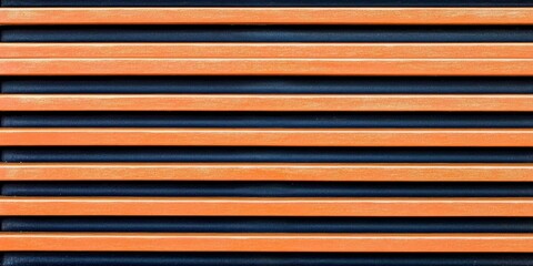 Obraz premium Horizontal stripes alternate between vibrant orange and black, showcasing a striking contrast that enhances the overall aesthetic of the space