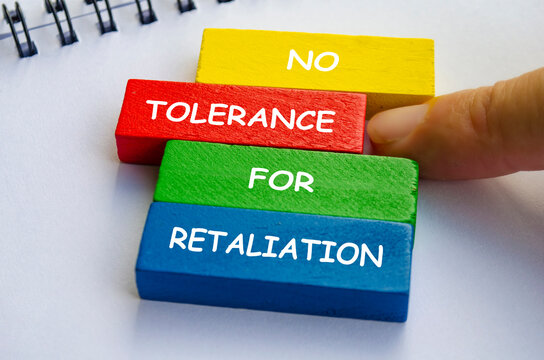 No Tolerance for Retaliation text on multicolored wooden blocks. No to negativity concept