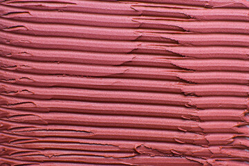 Top view of pink buttercream for decorating cake, silky smooth american buttercream with patterns, overhead view of smooth pink buttercream, cream textured background