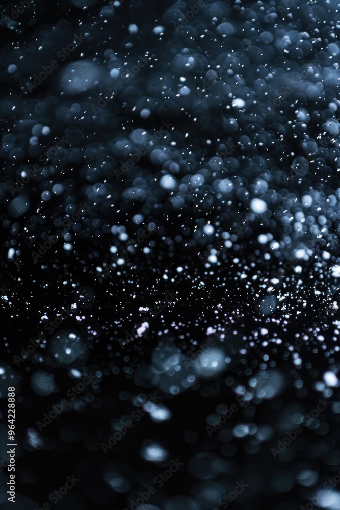 Poster a blurry image of snowflakes falling from the sky. the snowflakes are scattered all over the image, 