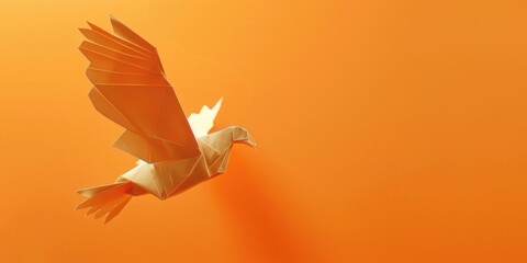A paper bird is flying over a bright orange background. The bird is made of paper and has a unique design. The orange background creates a warm and inviting atmosphere, making the image feel cheerful