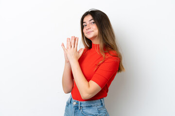 Young caucasian woman isolated on white background scheming something