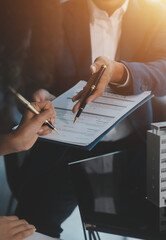 Real estate agent and customer signing contract to buy house, insurance or loan real estate.rent a house,get insurance or loan real estate or property.