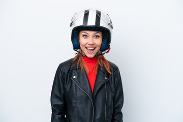 Young Russian girl with a motorcycle helmet isolated on white background with surprise facial expression