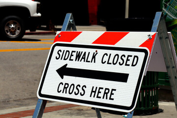 Road sign: Sidewalk Closed Sign