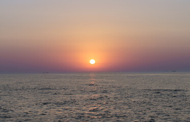 Serene sunset at the shoreline in Kolobrzeg, Kołobrzeg