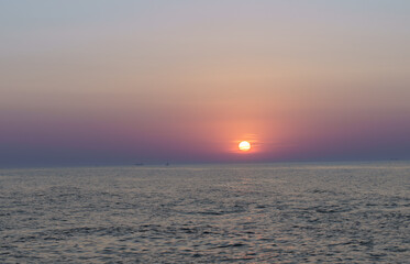 Serene sunset at the shoreline in Kolobrzeg, Kołobrzeg