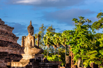 Background atmosphere inside the important historical tourist attraction Sukhothai Historical Park,foreign tourists from all over the world like to bring their children study history during holiday.