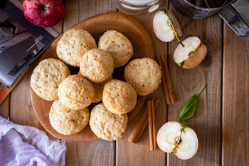 Sweet dessert for breakfast: apple cupcakes on a wooden background. Muffins with apples. Close-up. View from above