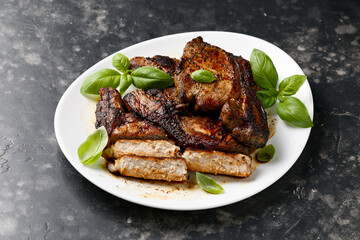 Grilled Pork Loin steaks in a white plate