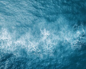 Fototapeta premium Aerial View of Calm Coastal Water with Intricate Wave Patterns