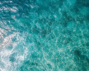 Fototapeta premium Aerial View of Clear Sea Water with Rippling Wave Patterns