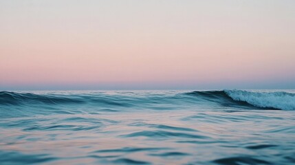 Obraz premium Tranquil Ocean Wave at Sunset