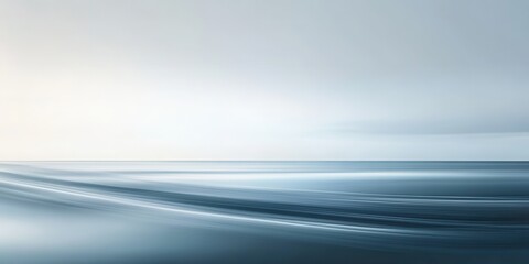 Serene coastal landscape with gentle waves, soft hues of blue, evoking calmness and tranquility in nature.