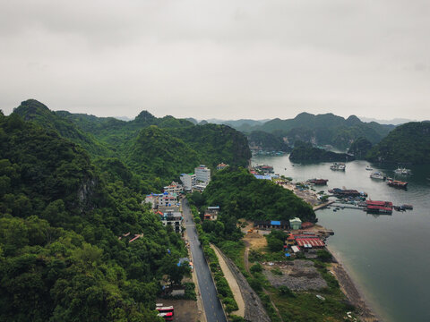 Aerial shot taken in cai beo ferry bay in Cat Ba Island overseeing the shouth china sea and the mountains surrounding ha long bay