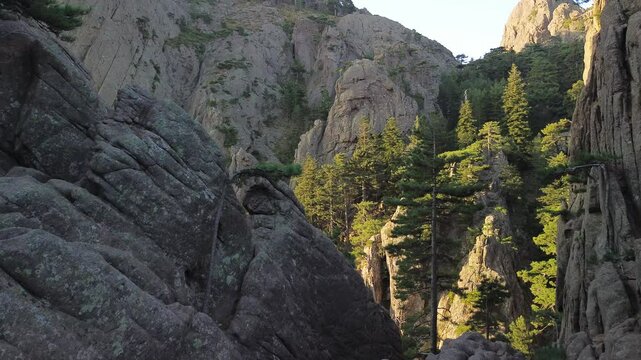 Trou de la Bombe, Massiv dde Bavella, Corse, France at sunrise, view from drone