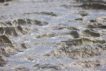water run-off during ebb tide at low tide