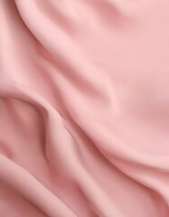 a close-up view of a soft, flowing fabric in a pale pink color. The fabric appears to be made of silk or satin, with a smooth and shiny texture. The fabric is crumpled, creating