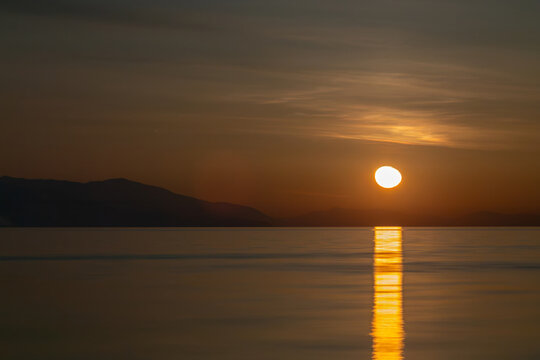 moonrise over mountain lake at night, Sevan in Armenia