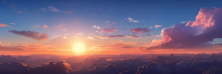A breathtaking sunset over a mountainous landscape, with vibrant orange and pink hues illuminating the sky and contrasting with the dark clouds below.