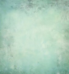 Fototapeta premium a textured, greenish-blue background with a slightly faded, distressed appearance.