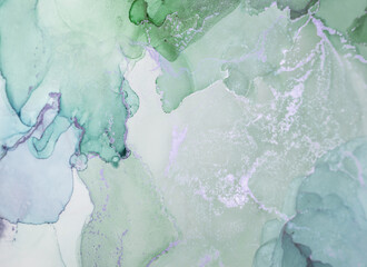 Delicate green and gray abstract watercolor pattern showcasing organic shapes and soft blending across the canvas