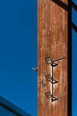 Three contemporary led streetlights illuminate night, highlighting eco-friendly technology in city settings