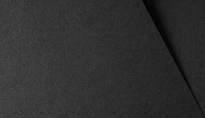 black paper texture with minimalist design and luxury backdrop Rich material with clean sheet structure and dark gradient effect Modern, elegant spread