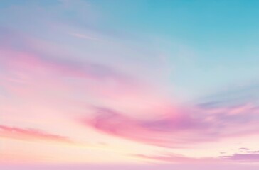 A serene sky blending soft pink and blue hues, creating a tranquil and peaceful atmosphere for relaxation and inspiration.