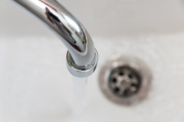 in the bathroom with running water