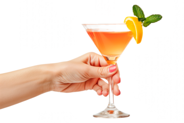 Cocktail in hand isolated on white or transparent background. Cocktail in woman's hand with orange and mint close-up.