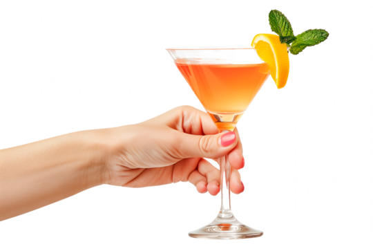 Cocktail in hand isolated on white or transparent background. Cocktail in woman's hand with orange and mint close-up.