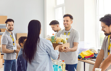 Volunteering people happy team, food bank box giving help to family, male volunteers working in charitable meal foundation making donation, charity separating basic need provisions, free help care