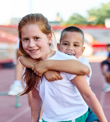 child sport athlete childhood girl competition fun young outdoor active exercise kid running fitness training athletic game healthy group play team school exercising